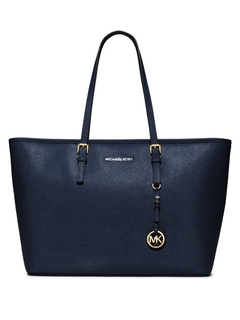 michael kors jet set travel blue tote bag|Michael Kors bag with airplanes.